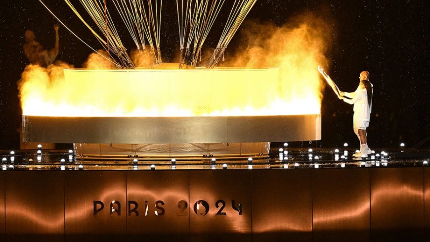 French Olympic heroes Marie-José Pérec, Teddy Riner light cauldron to kick off Paris games