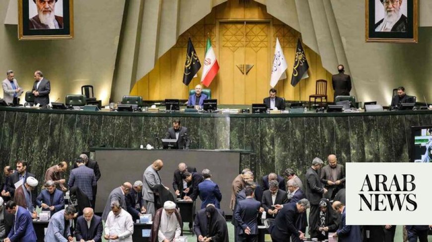 Iran’s hardline parliament approves all members of president’s Cabinet, first time since 2001