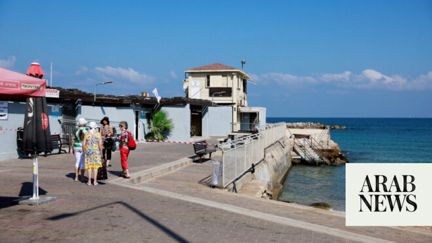 Israeli beachgoers try to brush off Hezbollah threat