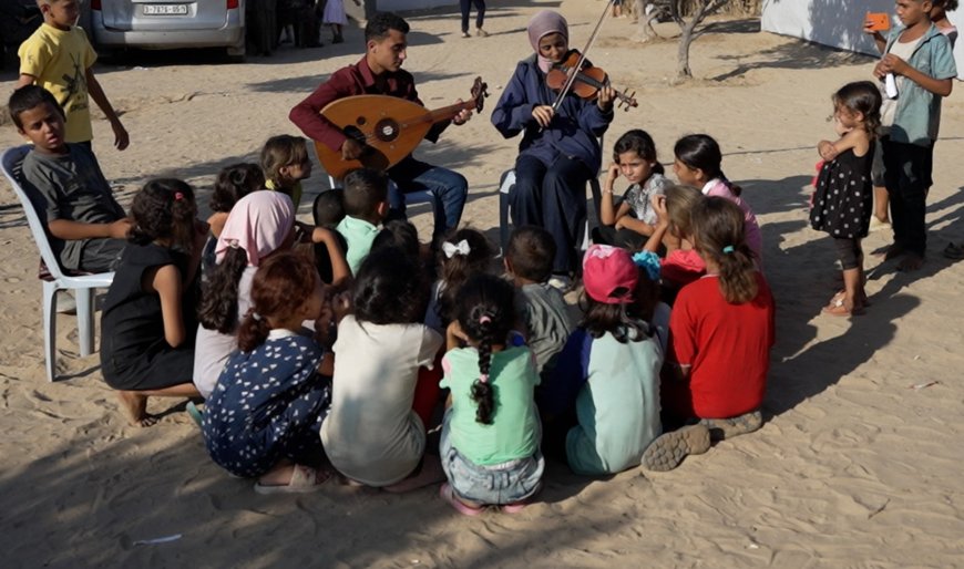 Gaza music students use talent to inspire children displaced by war