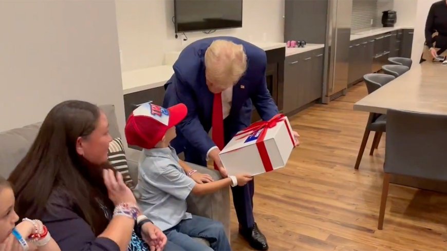 SEE IT: Trump meets young supporter with rare brain disorder backstage at rally